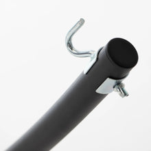 Load image into Gallery viewer, Close-up of the metal hanging hook and capped end of the black steel arc hammock stand