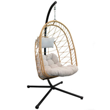 Load image into Gallery viewer, Cappuccino Deluxe Nest Chair with beige cushions and a black steel stand on a white background