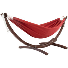 Load image into Gallery viewer, Crimson double Sunbrella® hammock on a curved solid pine stand against a white background.