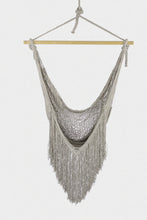 Load image into Gallery viewer, Front view of Grey Moon hammock swing chair showing the net seat, cascading fringe and wooden spreader bar