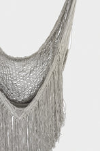 Load image into Gallery viewer, Close-up of the Grey Moon hammock swing chair's woven net seat and fringed edge