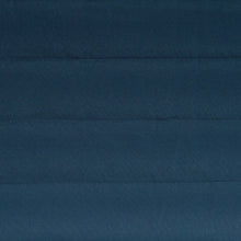 Load image into Gallery viewer, Close-up of navy blue hammock fabric showing its quilted stitching.