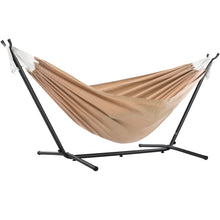Load image into Gallery viewer, Vivere Sand double Sunbrella® hammock on a black steel stand against a white background.